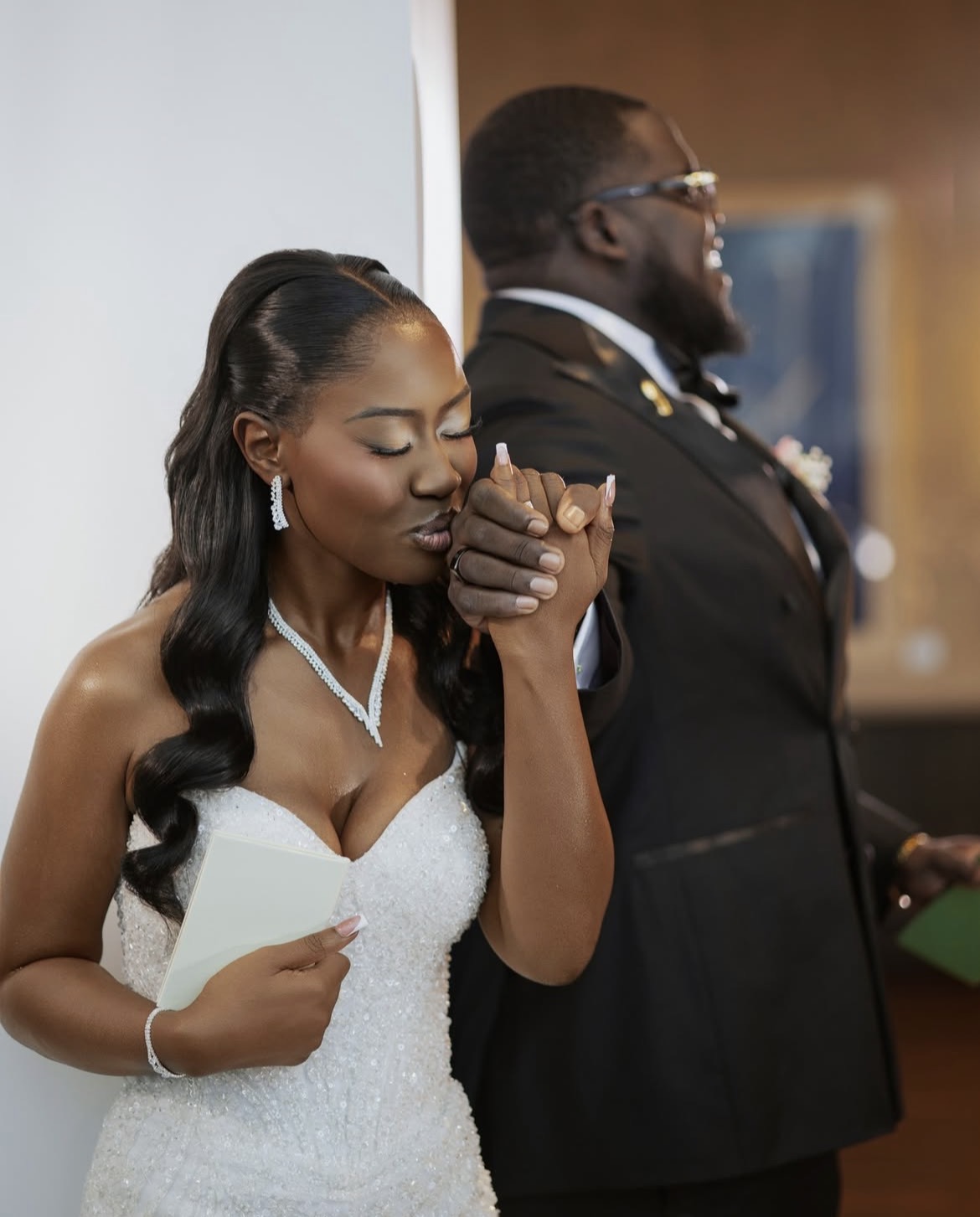 Bridal couple kiss